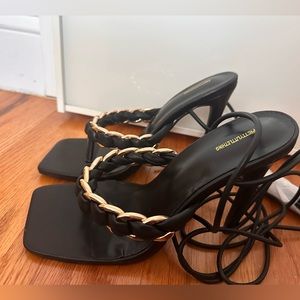 Never worn black & gold chain heels!